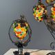 Set of three lamps in bronze and polychrome Murano glass, 20th century