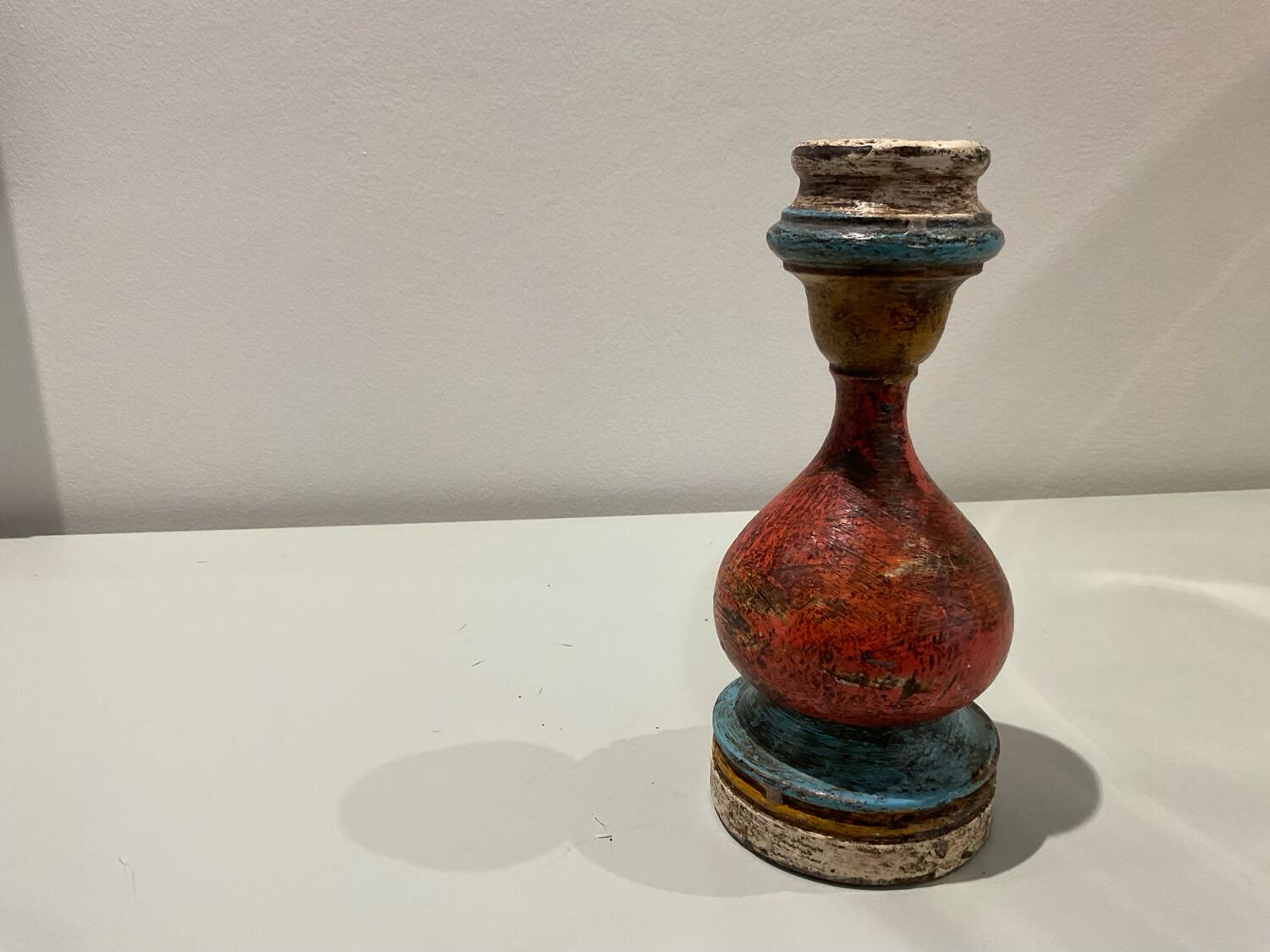 Painted wooden candle holder