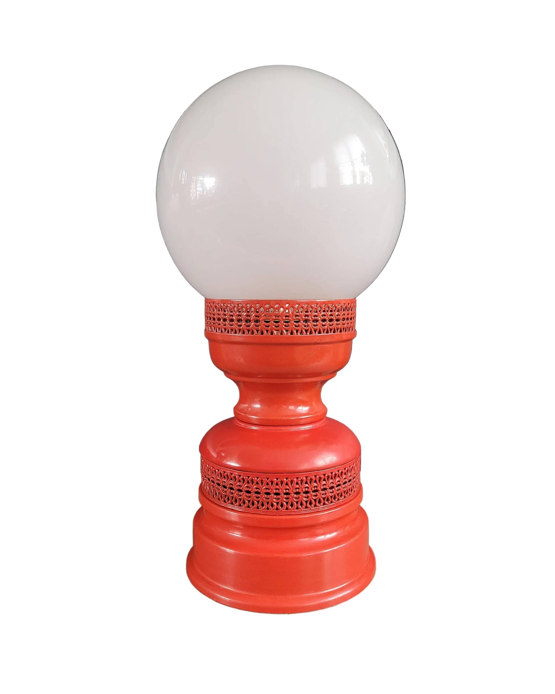 Vintage globe lamp with a metal base, perforated and lacquered in red.