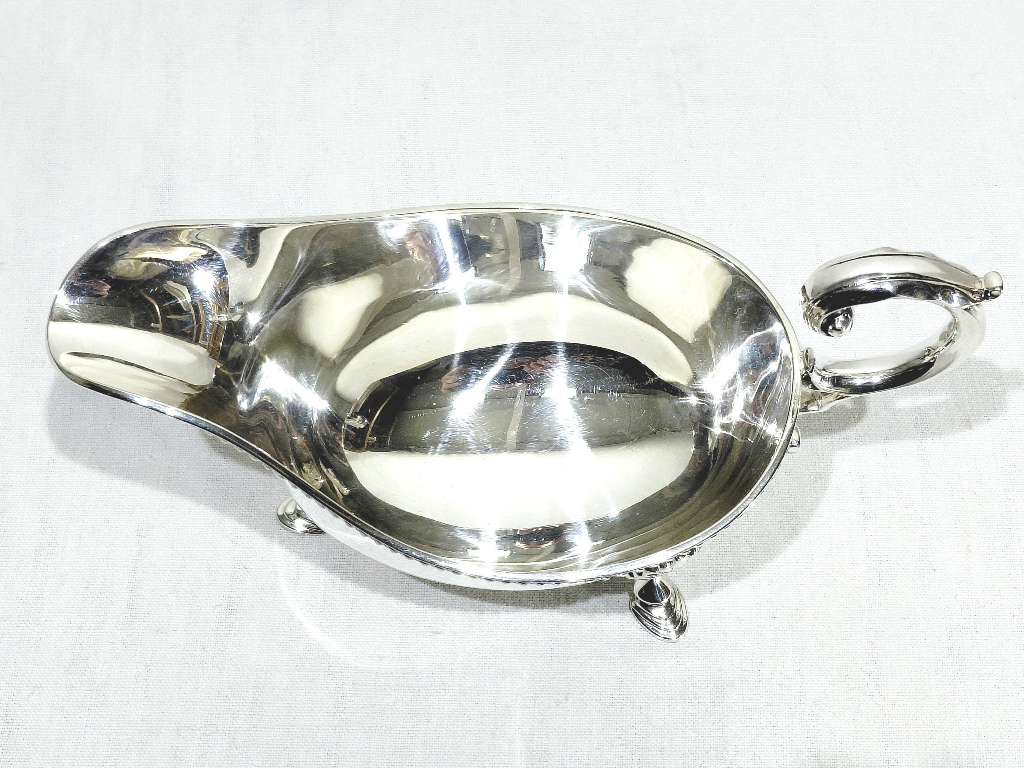 Silver sauceboat, England