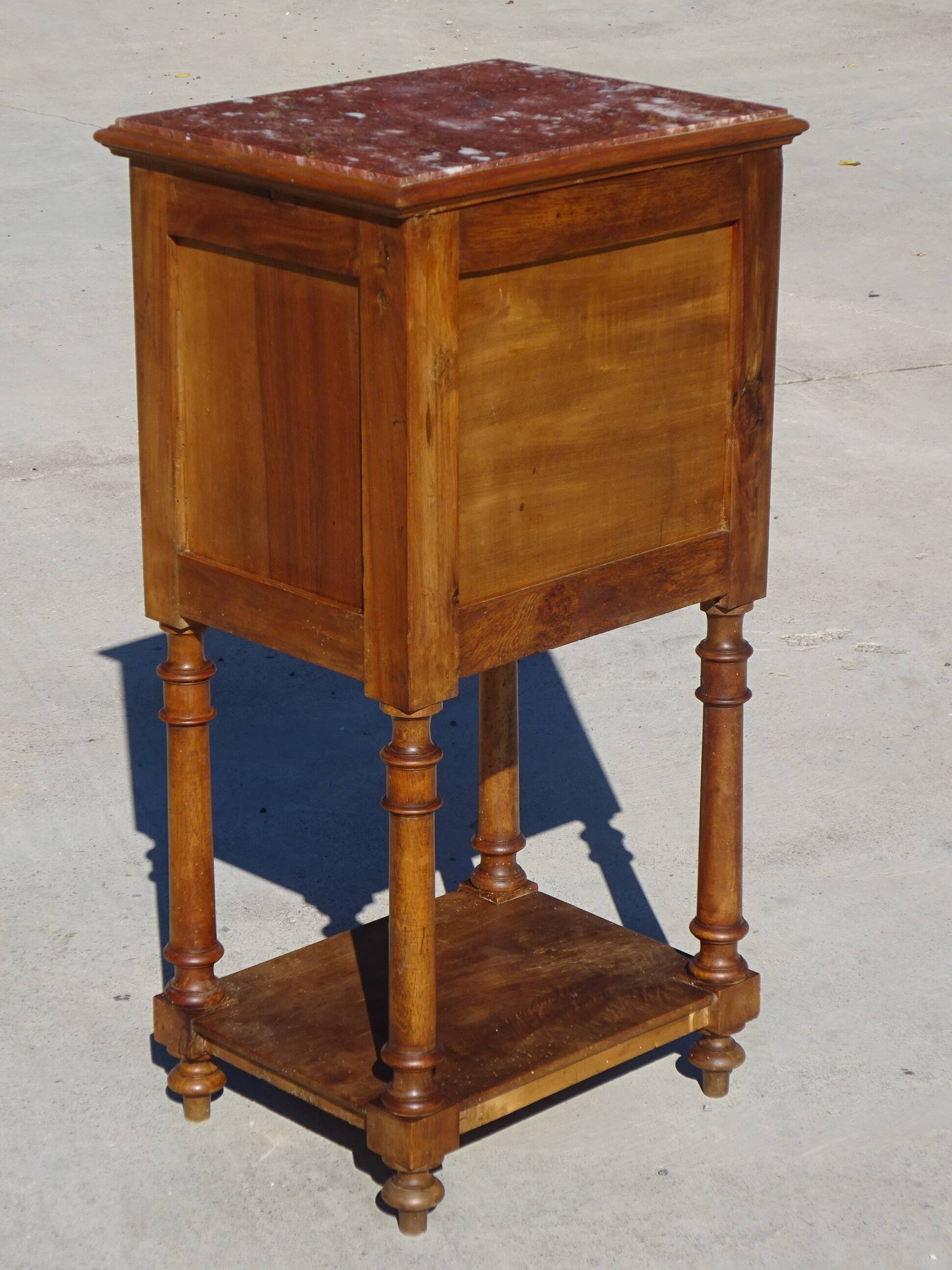 Antique Louis XVI style bedside table in walnut, with a marble top.