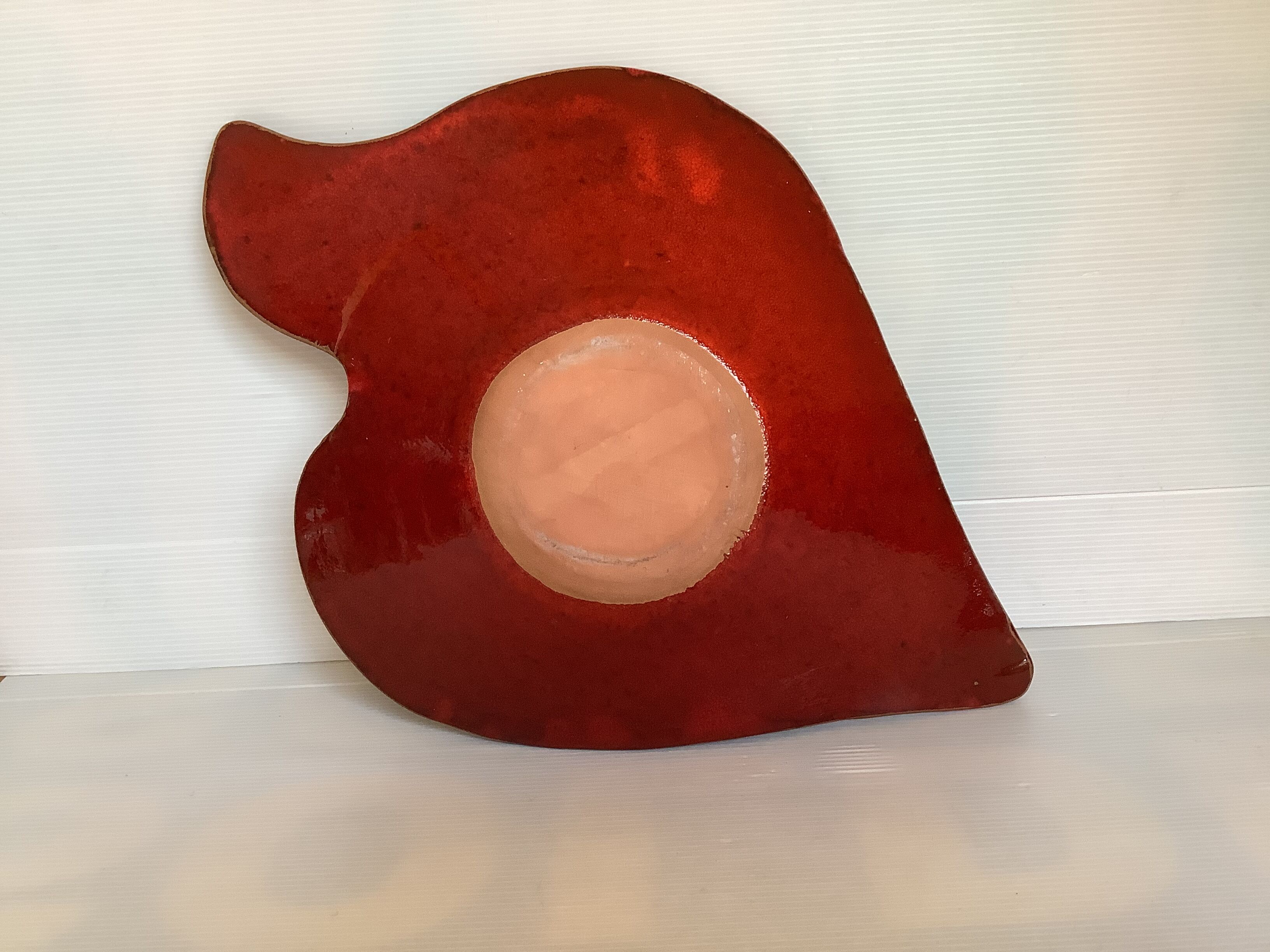 Red terracotta spiral pattern fruit bowl