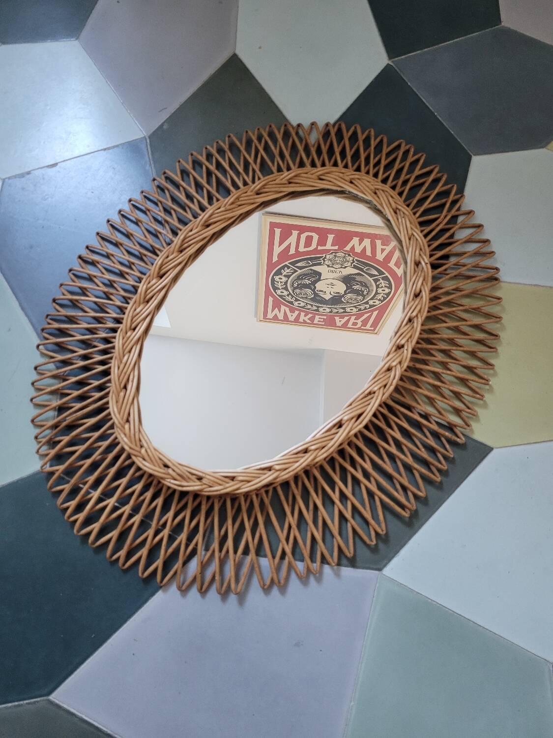 Oval rattan mirror