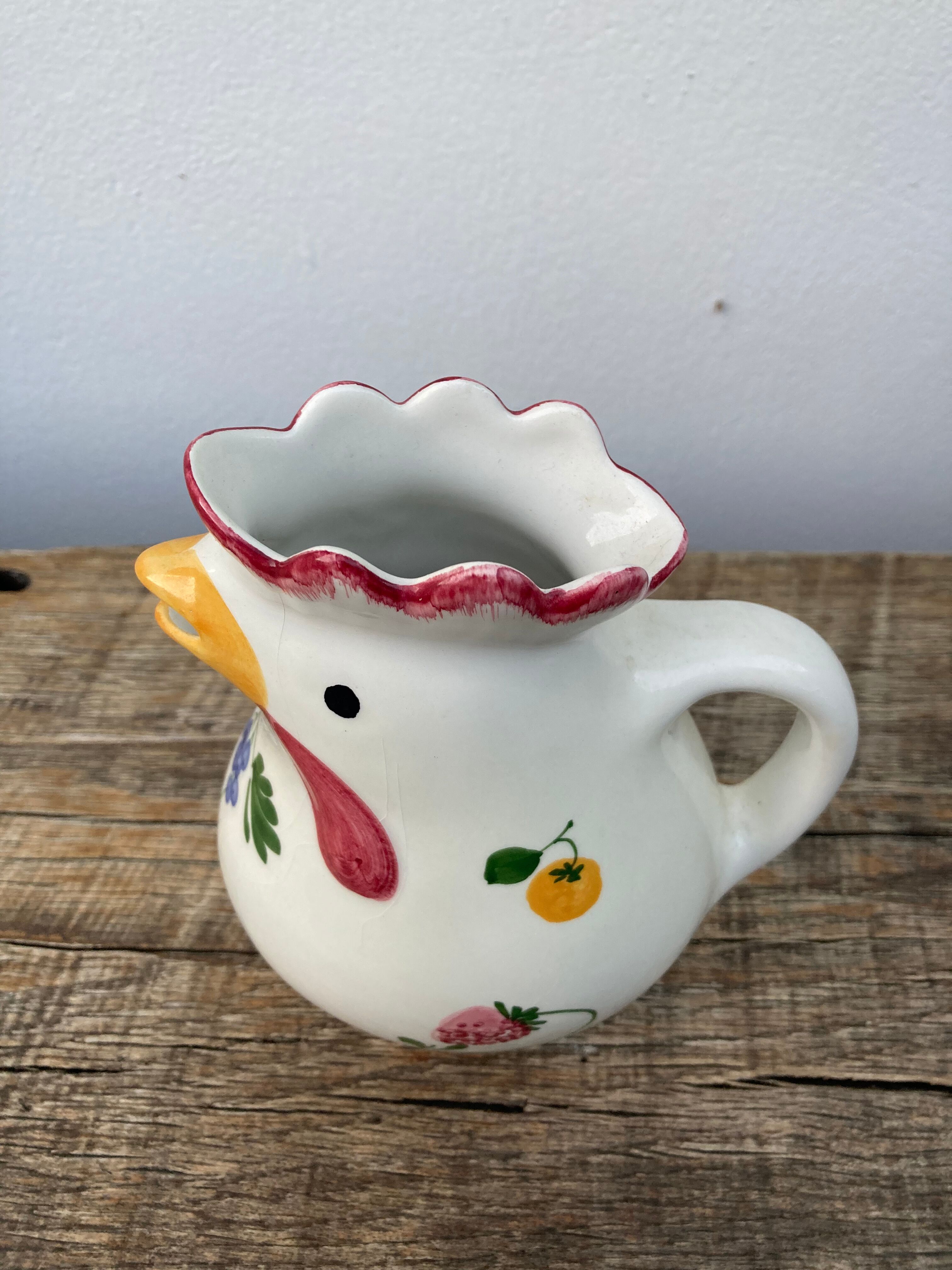 Ceramic rooster pitcher decorated with vintage flowers
