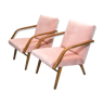 Paire de fauteuils années 60 retapissés velours rose poudré