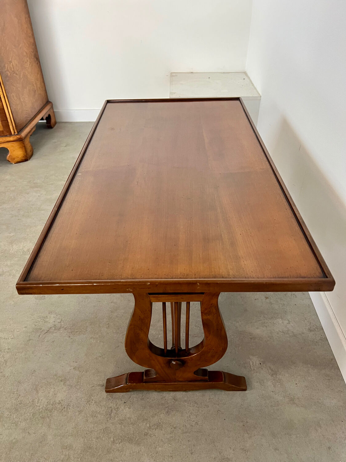 Old rectangular wood coffee table with lyre side posts