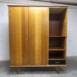 French wardrobe with tapered legs, 3 doors, 1 mirror (27*130), and 1 drawer.
