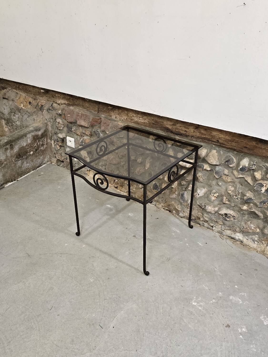 Small side table in wrought iron and smoked glass