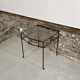 Petite table d'appoint en fer forgé et verre fumé