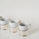 Set of 4 porcelain and silver-plated coffee cups, 1970.
