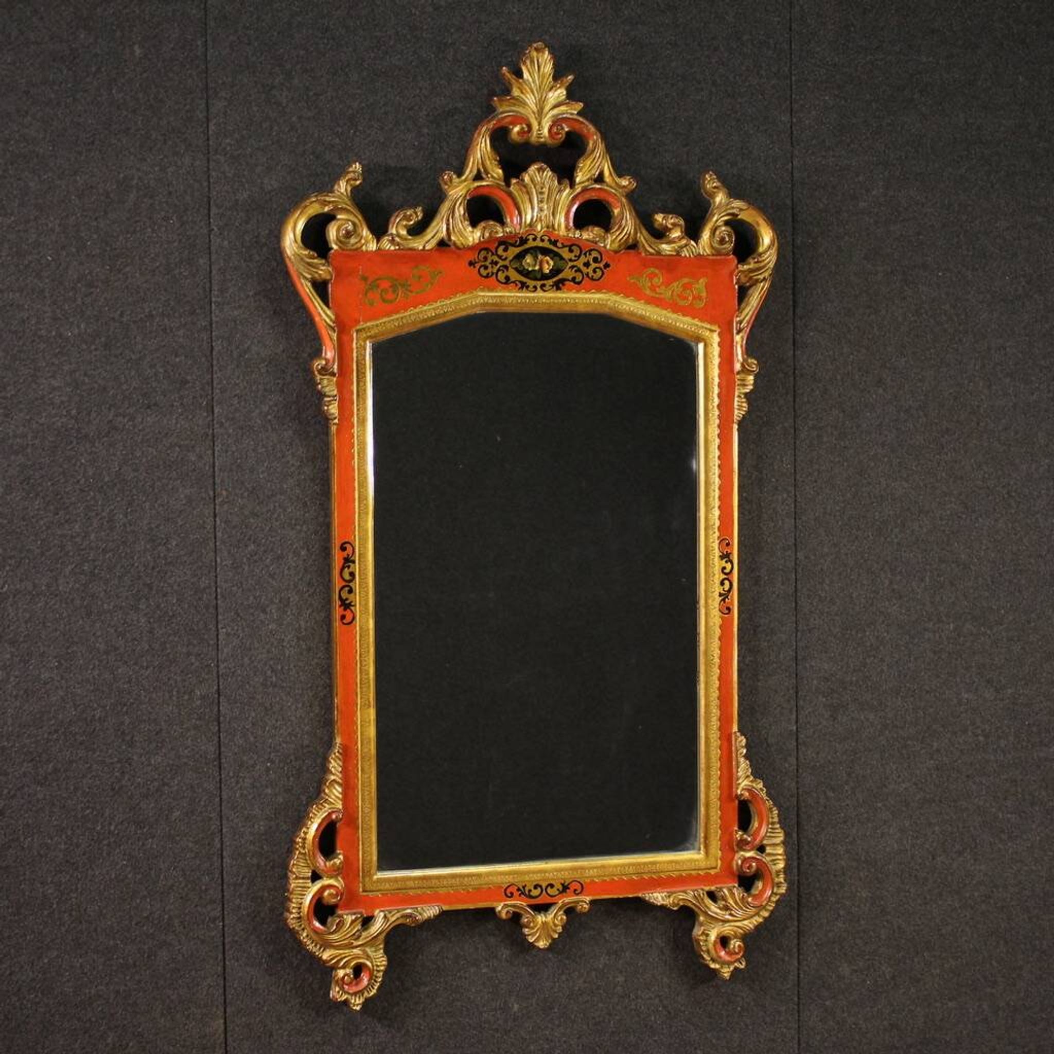 Miroir toscan laqué et doré du XXe siècle