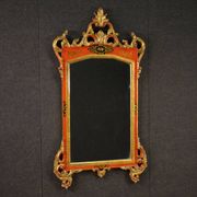 Miroir toscan laqué et doré du XXe siècle