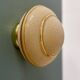 Vintage Art Deco globe wall/ceiling light in frosted yellow and gold glass.