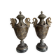 According to Émile Louis Picault, sculptor, a pair of large decorative vases.