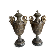 According to Émile Louis Picault, sculptor, a pair of large decorative vases.