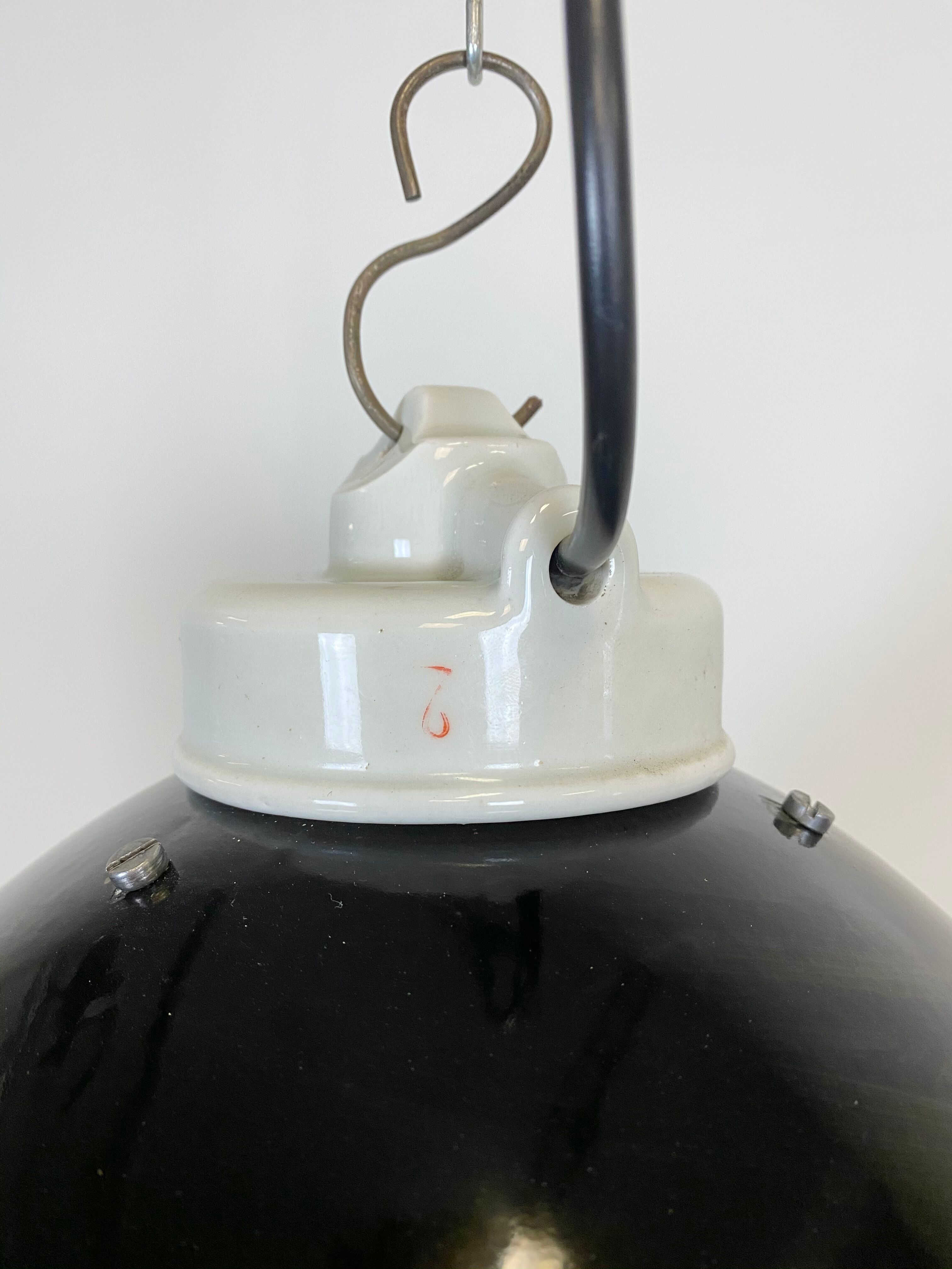Industrial black enamel lamp with porcelain top, 1950s