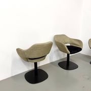 Series of six swivel chairs with organic shell, mottled fabric and base dis