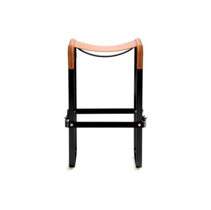 Pair of stools without a backrest in tobacco colour and black metal.