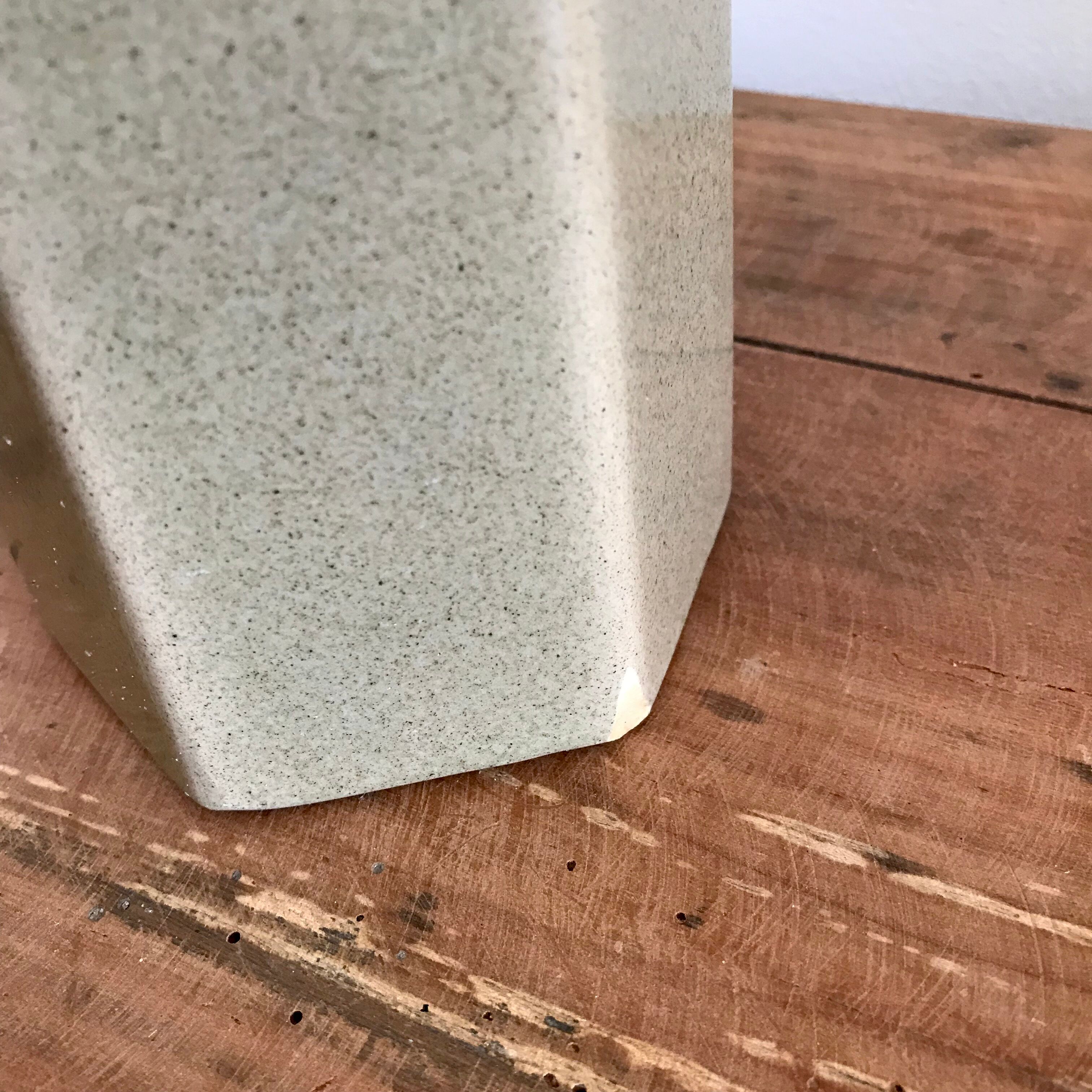 Hexagonal sandstone bottle