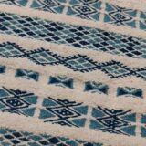Traditional handmade white and blue carpet
