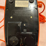 Orange vintage phone with socotel dial