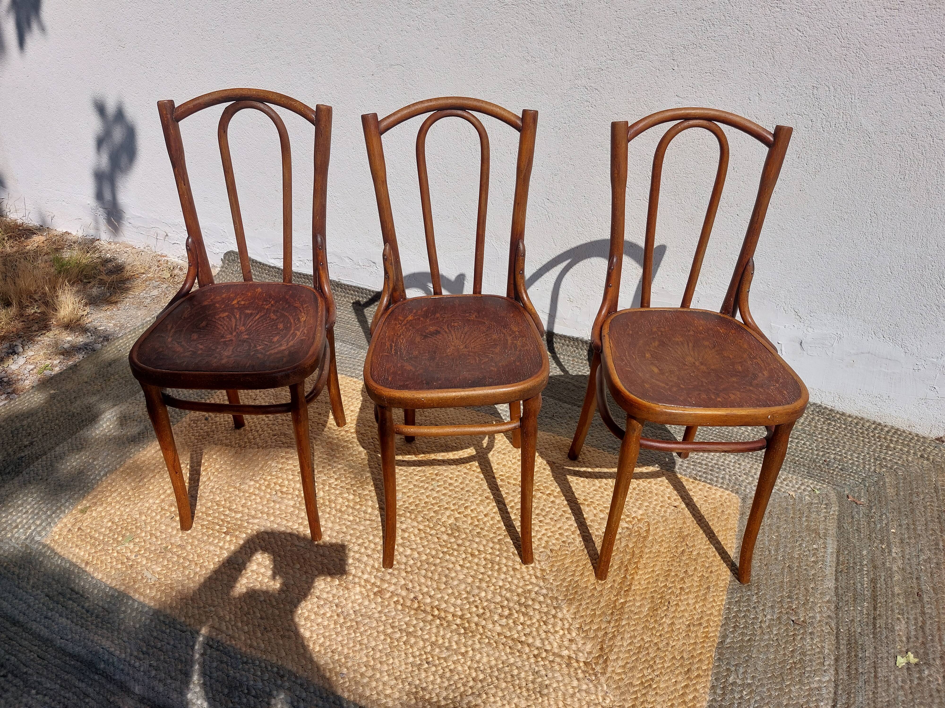 set of 3 curved wooden bistro chairs with patterns