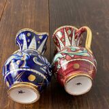 Antique pinched pitchers in earthenware and slip