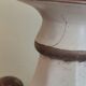 Large pagoda lamp painted with floral patterns and metal shade.