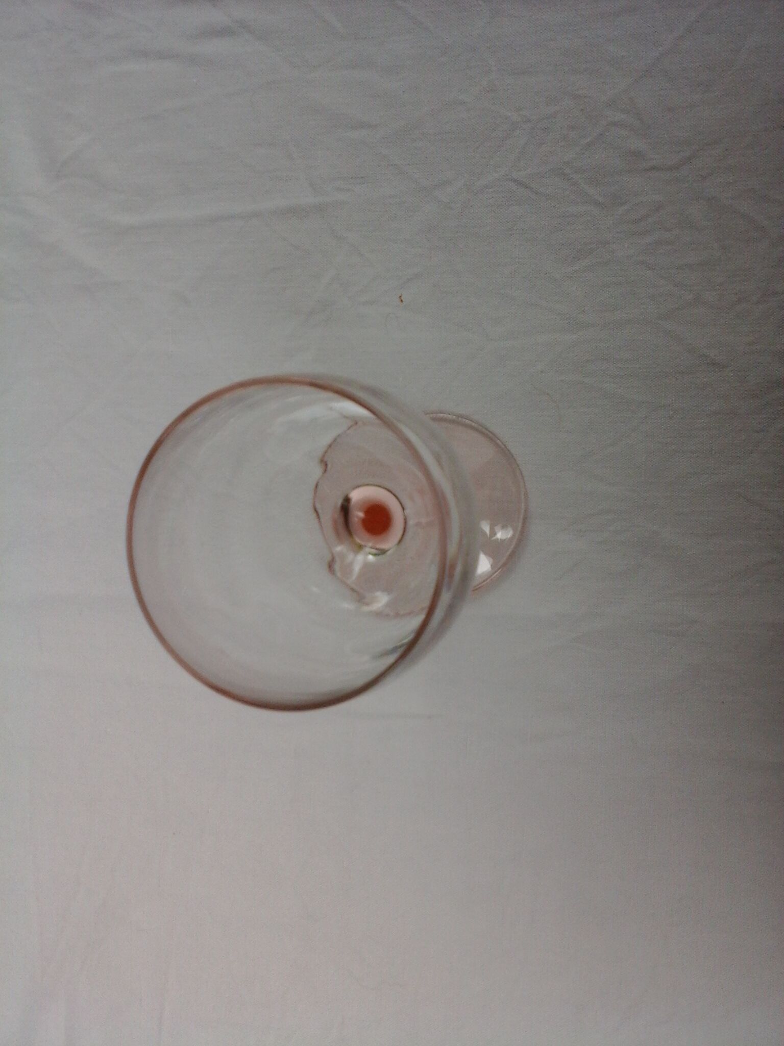 6 glasss of wine on pink foot