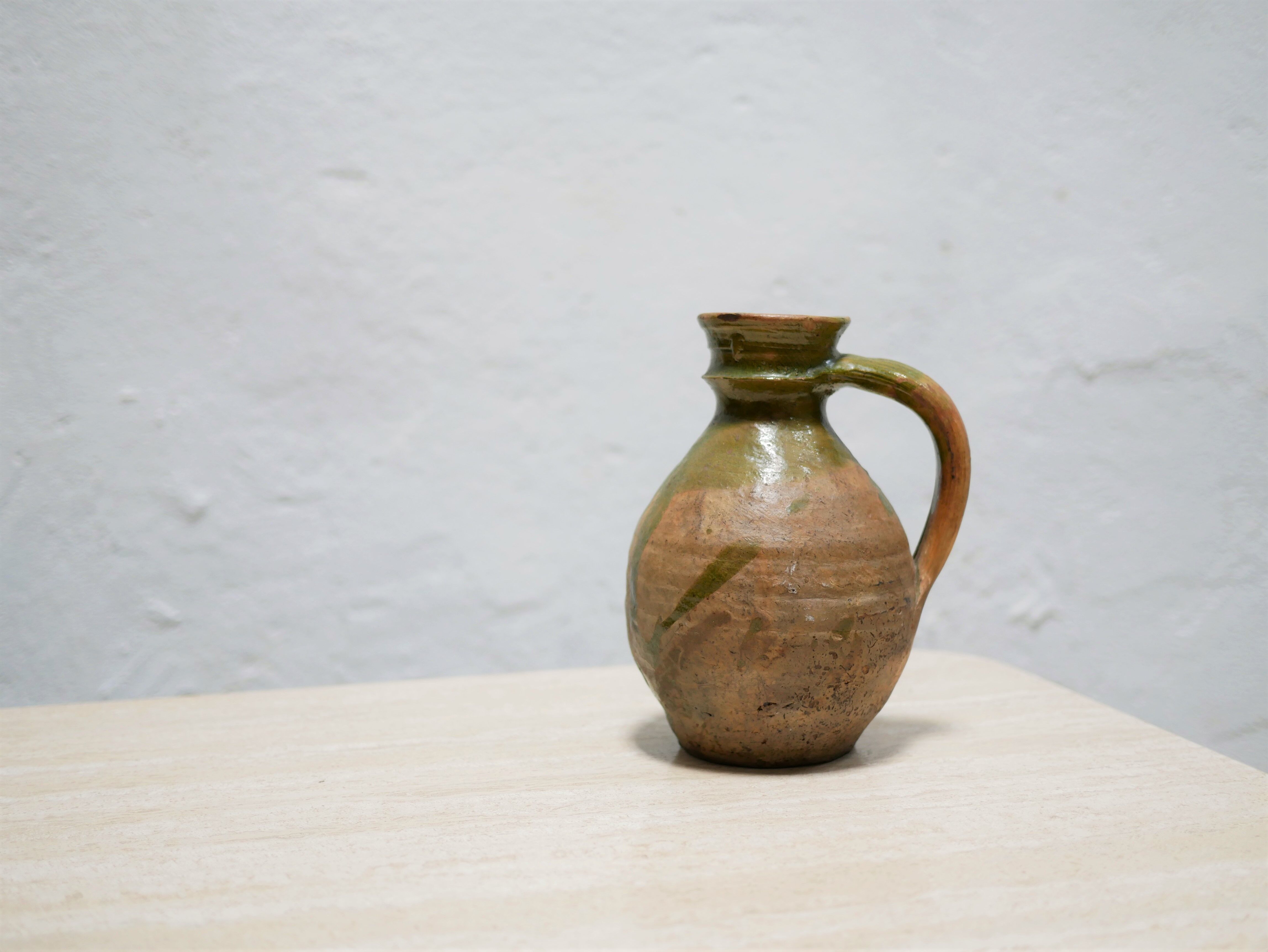 Old glazed terracotta jar