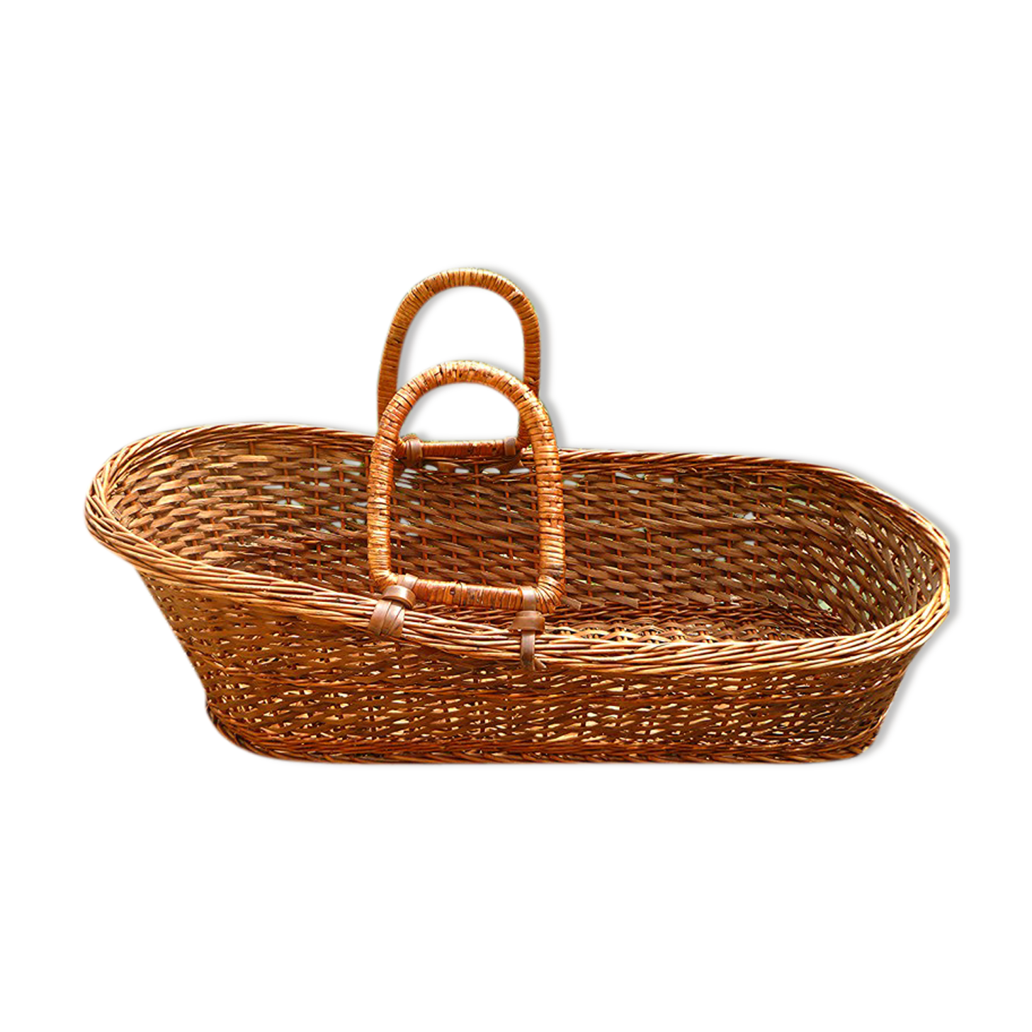 Old braided wicker couffin