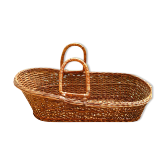 Old braided wicker couffin