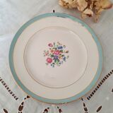 7 mismatched antique dessert plates accompanied by a pie dish