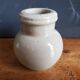 Small beige ball vase in glazed sandstone