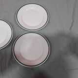 3 plates in white porcelain and green edging
