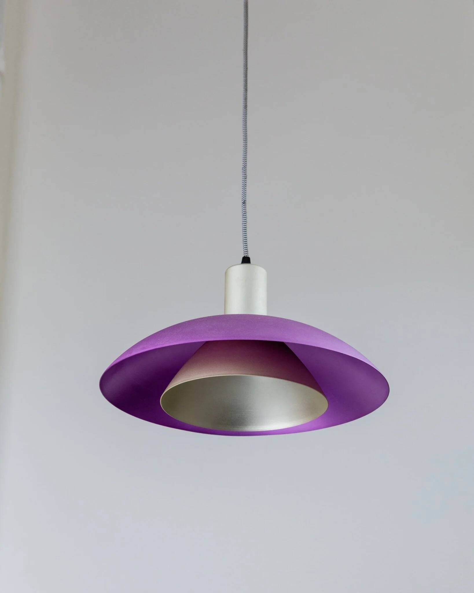 Vintage metal ceiling suspension – postmodern Memphis style from the 1980s, purple, green, silver, striped cable, Pop Art interior, retro light fixture.