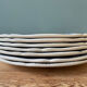 Set of 7 flat plates in Gien earthenware, Delft décor