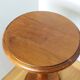 Round pedestal table in solid wood