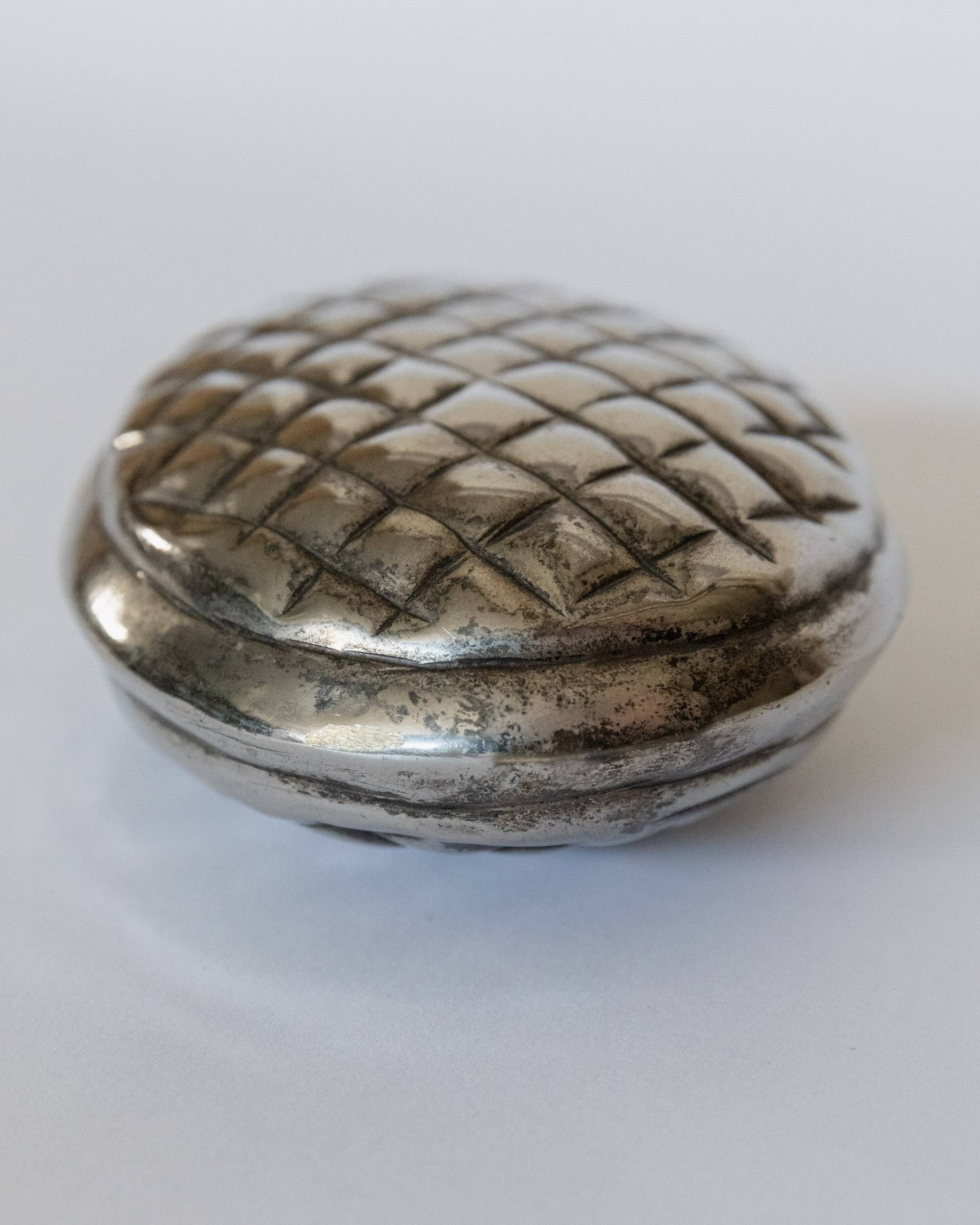Vintage 1950s silver-plated flask in the shape of a pine cone.