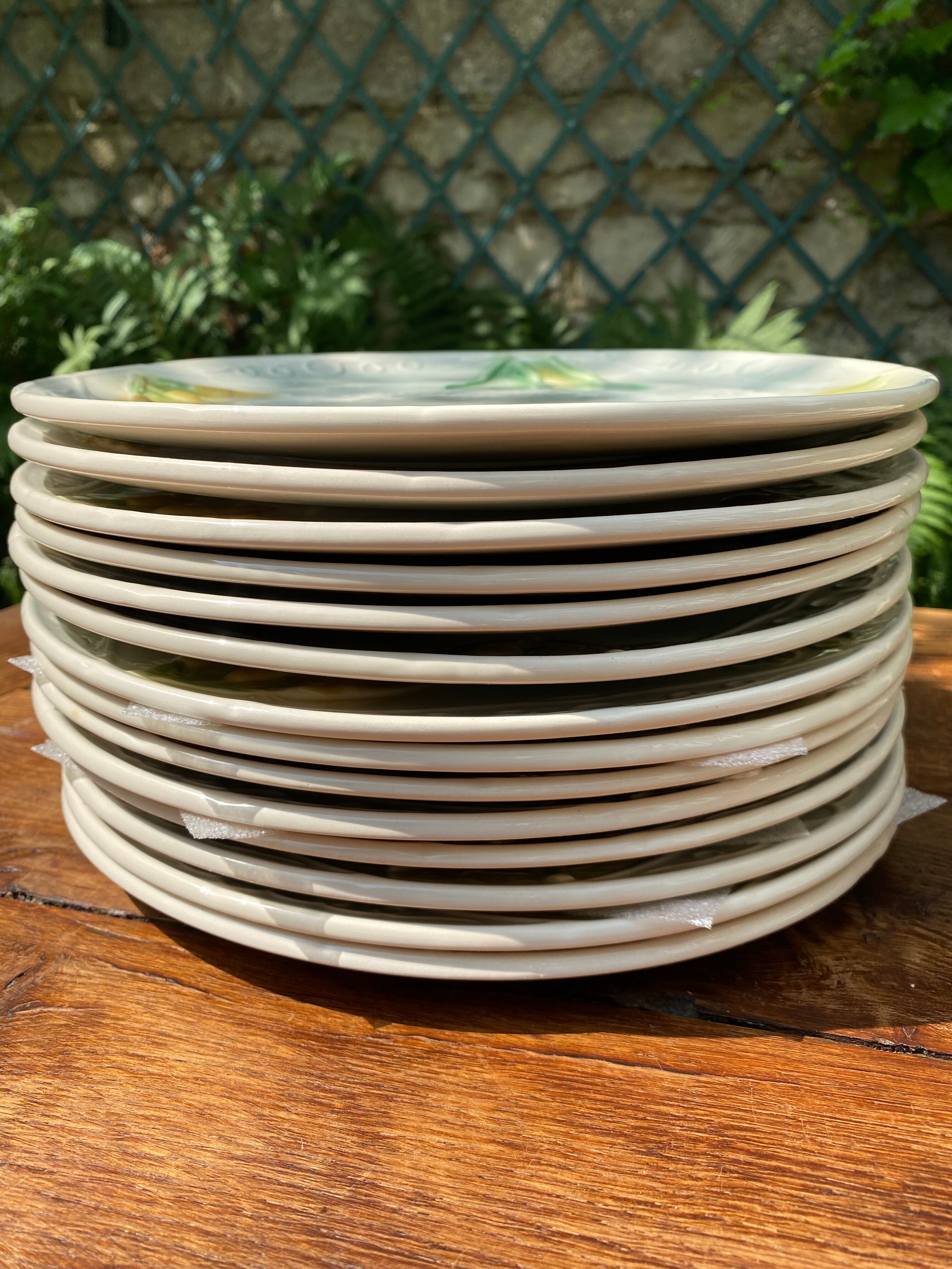 Service 10 plates and 14 sub-plates St Clement