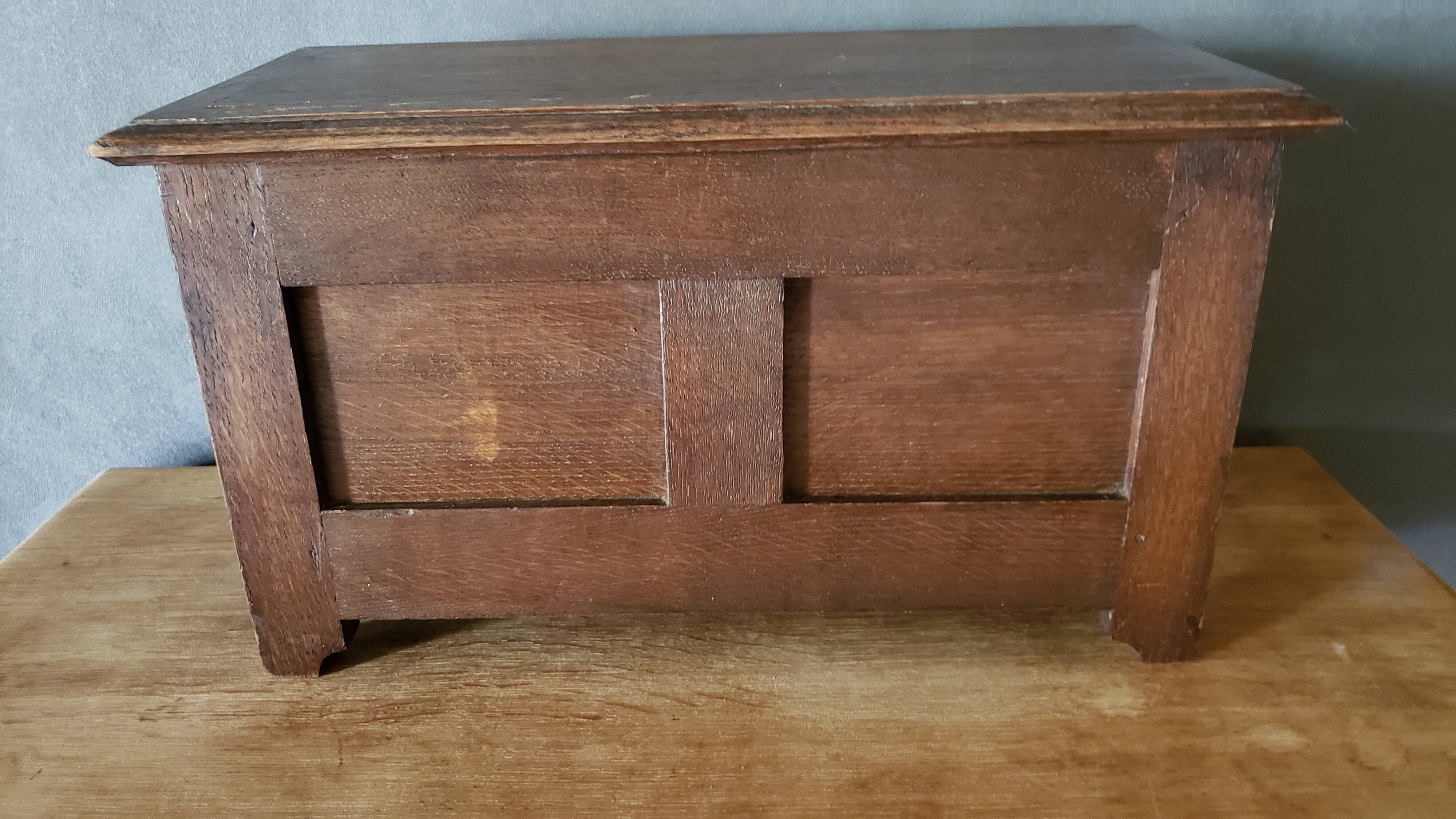 Mini carved oak chest