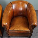 Set of 2 club chairs in black piping sheep leather
