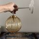 Glass globe wall light