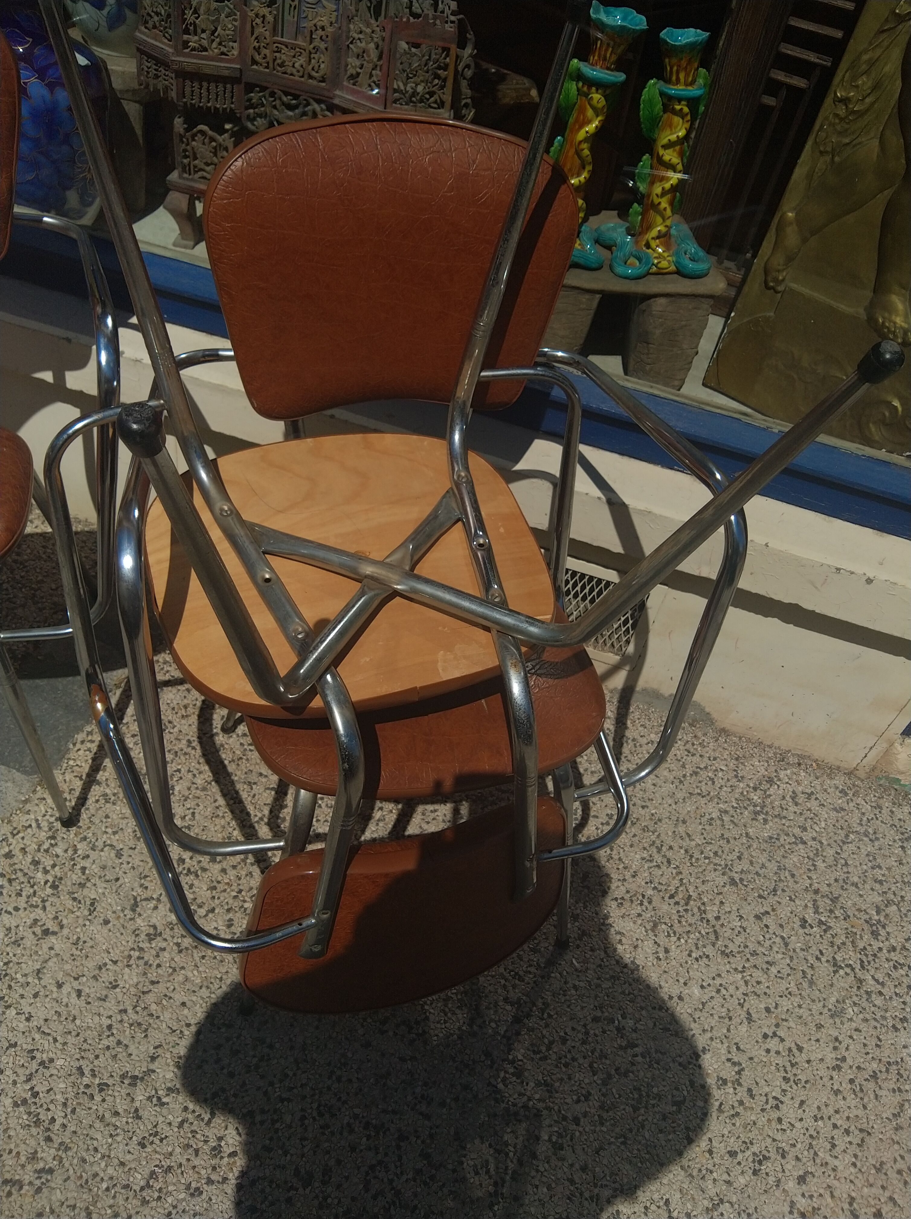 Set of 4 armchairs in chromed metal and brown imitation leather, circa 1960