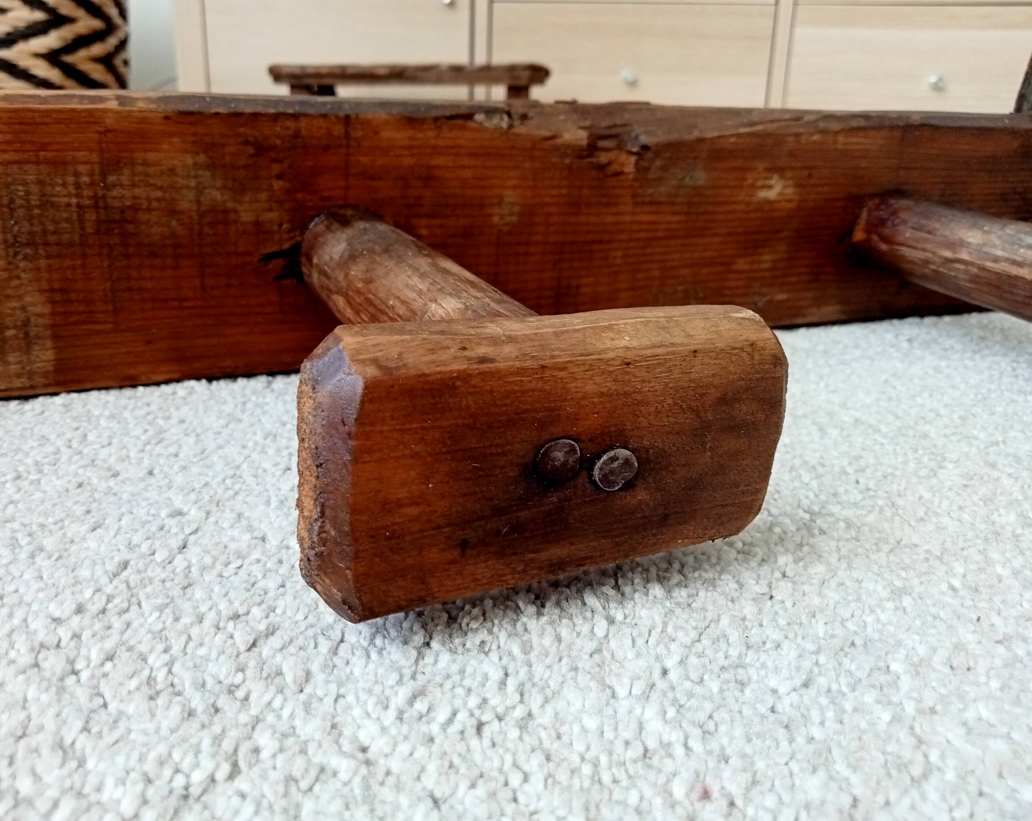 Old wall-mounted coat rack from a stable, folk art.