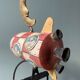 Old painted sheet metal pendulum toy