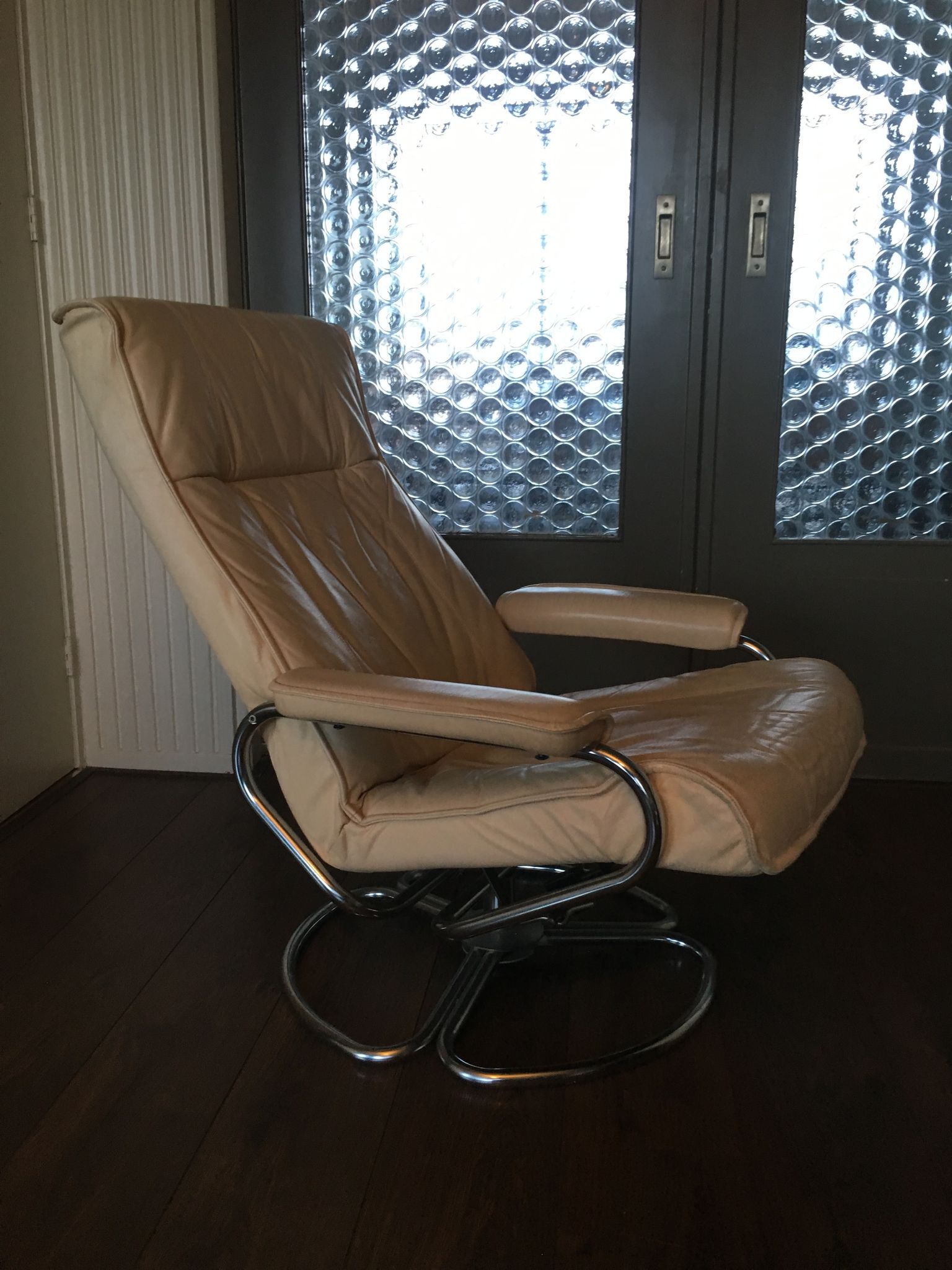 Mid-century danish leather & tubular steel swivel lounge armchair