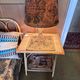 Vintage bedside table in bamboo and rattan with decorative top.