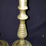 Former pair of bronze candlesticks