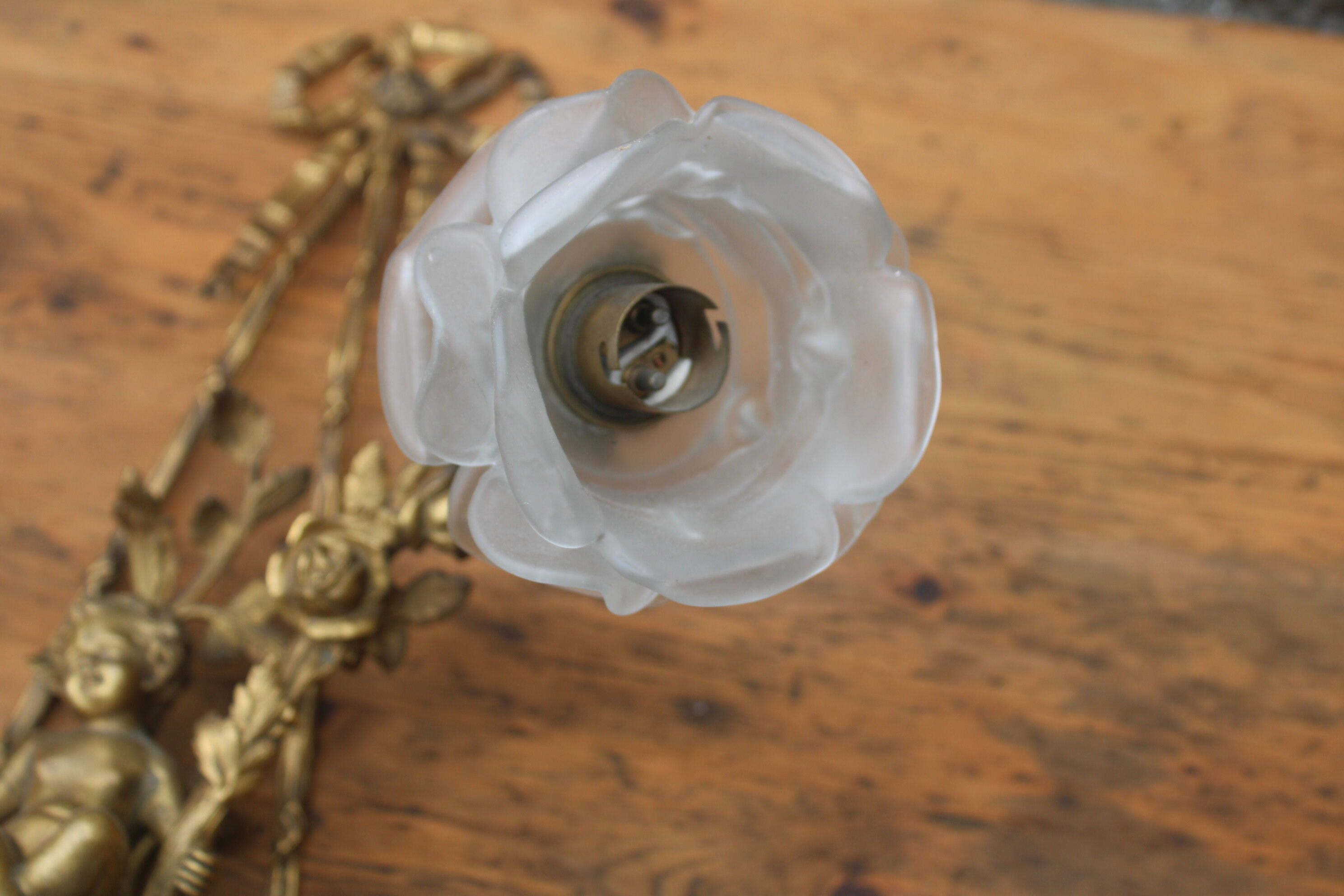 Wall lamp in bronze cherub